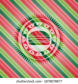 icono de cheeseburger dentro del emblema del estilo de los colores de navidad. 