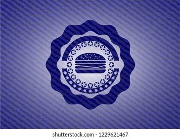 cheeseburger icon inside denim background
