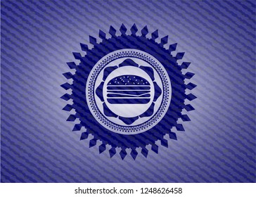 cheeseburger icon inside denim background