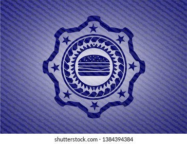 cheeseburger icon inside denim background