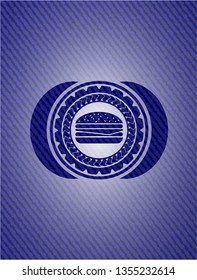 cheeseburger icon inside emblem with denim high quality background