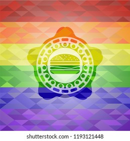 cheeseburger icon inside emblem on mosaic background with the colors of the LGBT flag