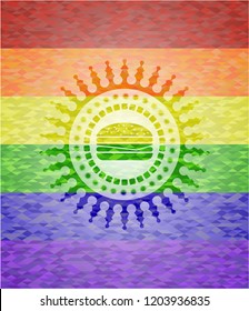 cheeseburger icon inside emblem on mosaic background with the colors of the LGBT flag