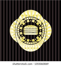 cheeseburger icon inside gold emblem or badge