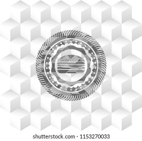 cheeseburger icon inside grey badge with geometric cube white background