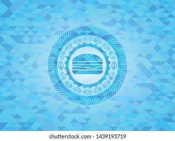 cheeseburger icon inside light blue emblem with mosaic background