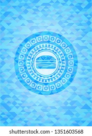 cheeseburger icon inside realistic light blue emblem. Mosaic background