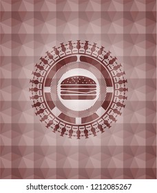 cheeseburger icon inside red seamless emblem with geometric pattern background.
