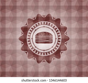 cheeseburger icon inside red seamless emblem with geometric background.