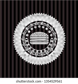 cheeseburger icon inside silver emblem