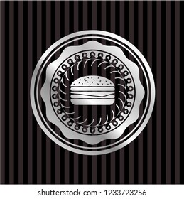 cheeseburger icon inside silvery badge or emblem