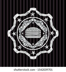 cheeseburger icon inside silvery emblem or badge
