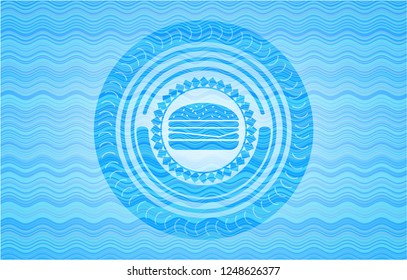 cheeseburger icon inside sky blue water style emblem.