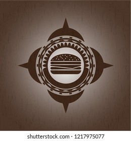 cheeseburger icon inside vintage wooden emblem