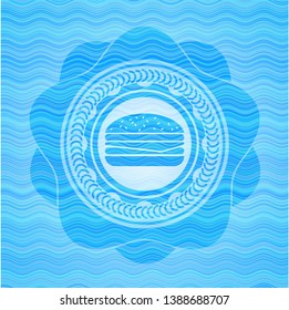 cheeseburger icon inside water concept style emblem.