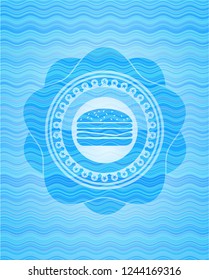 cheeseburger icon inside water representation style badge.
