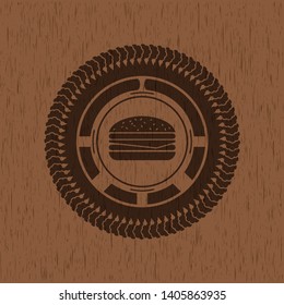 cheeseburger icon inside wood emblem. Retro
