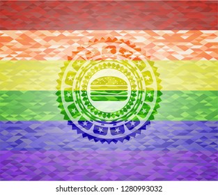 cheeseburger icon on mosaic background with the colors of the LGBT flag