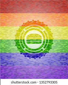 cheeseburger icon on mosaic background with the colors of the LGBT flag