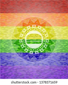 cheeseburger icon on mosaic background with the colors of the LGBT flag
