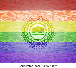 cheeseburger icon on mosaic background with the colors of the LGBT flag