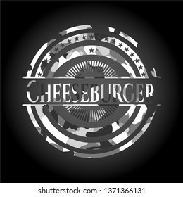 Cheeseburger on grey camouflage texture