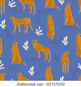 Cheetah and leopards in the jungle seamless pattern.