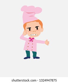 Chef , is angry and points his head with his index finger.