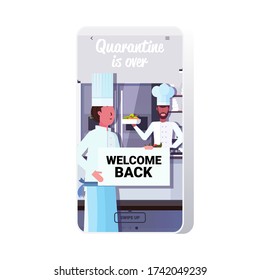 chef cooks holding welcome back sign board coronavirus quarantine is ending victory over covid-19 concept restaurant kitchen interior smartphone screen mobile app copy space vector illustration