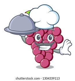 Chef with food red grapes fruit above mascot table
