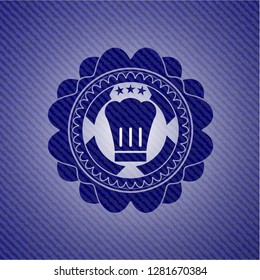 chef hat icon inside badge with denim texture