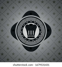 icono del sombrero de chef dentro del emblema negro
