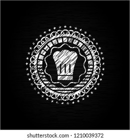 chef hat icon inside chalkboard emblem