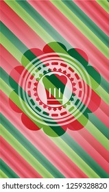 chef hat icon inside christmas colors badge.
