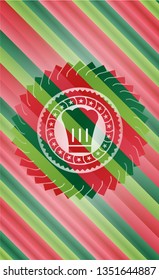 chef hat icon inside christmas style badge..