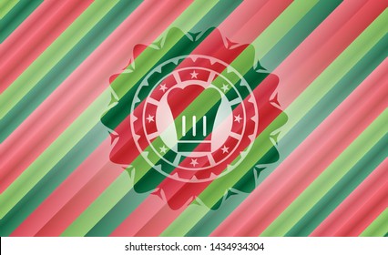 chef hat icon inside christmas emblem background.