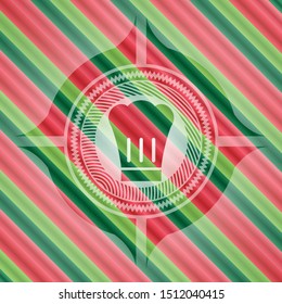 chef hat icon inside christmas colors emblem.