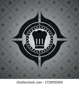 icono del sombrero chef dentro del emblema oscuro. 