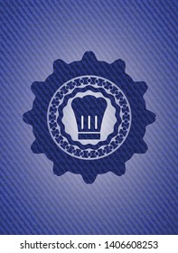 chef hat icon inside emblem with jean texture