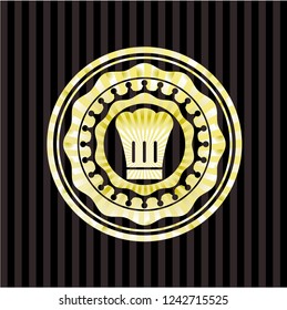 chef hat icon inside golden badge or emblem