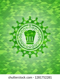 chef hat icon inside green emblem. Mosaic background