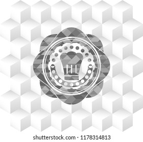 chef hat icon inside grey badge with geometric cube white background