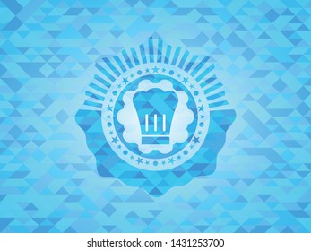 chef hat icon inside light blue mosaic emblem