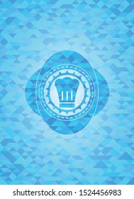 chef hat icon inside light blue emblem with mosaic background