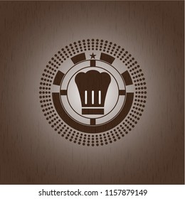 chef hat icon inside realistic wood emblem
