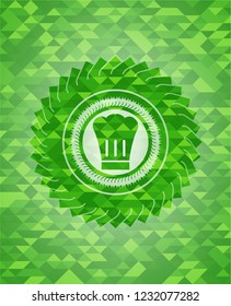 chef hat icon inside realistic green emblem. Mosaic background