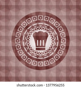 chef hat icon inside red seamless emblem or badge with abstract geometric pattern background.