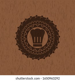 Icono de sombrero de chef dentro del emblema de madera de estilo retro