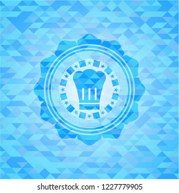chef hat icon inside sky blue emblem. Mosaic background