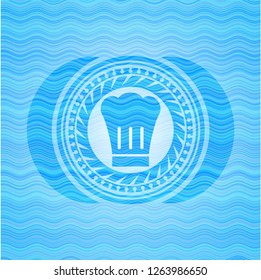 chef hat icon inside sky blue water badge.